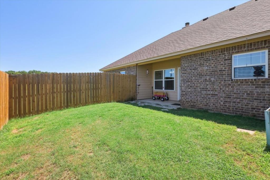 1215 River Hills Road Stephenville, TX 76401 - Photo 22 of 26 Fenced Backyard