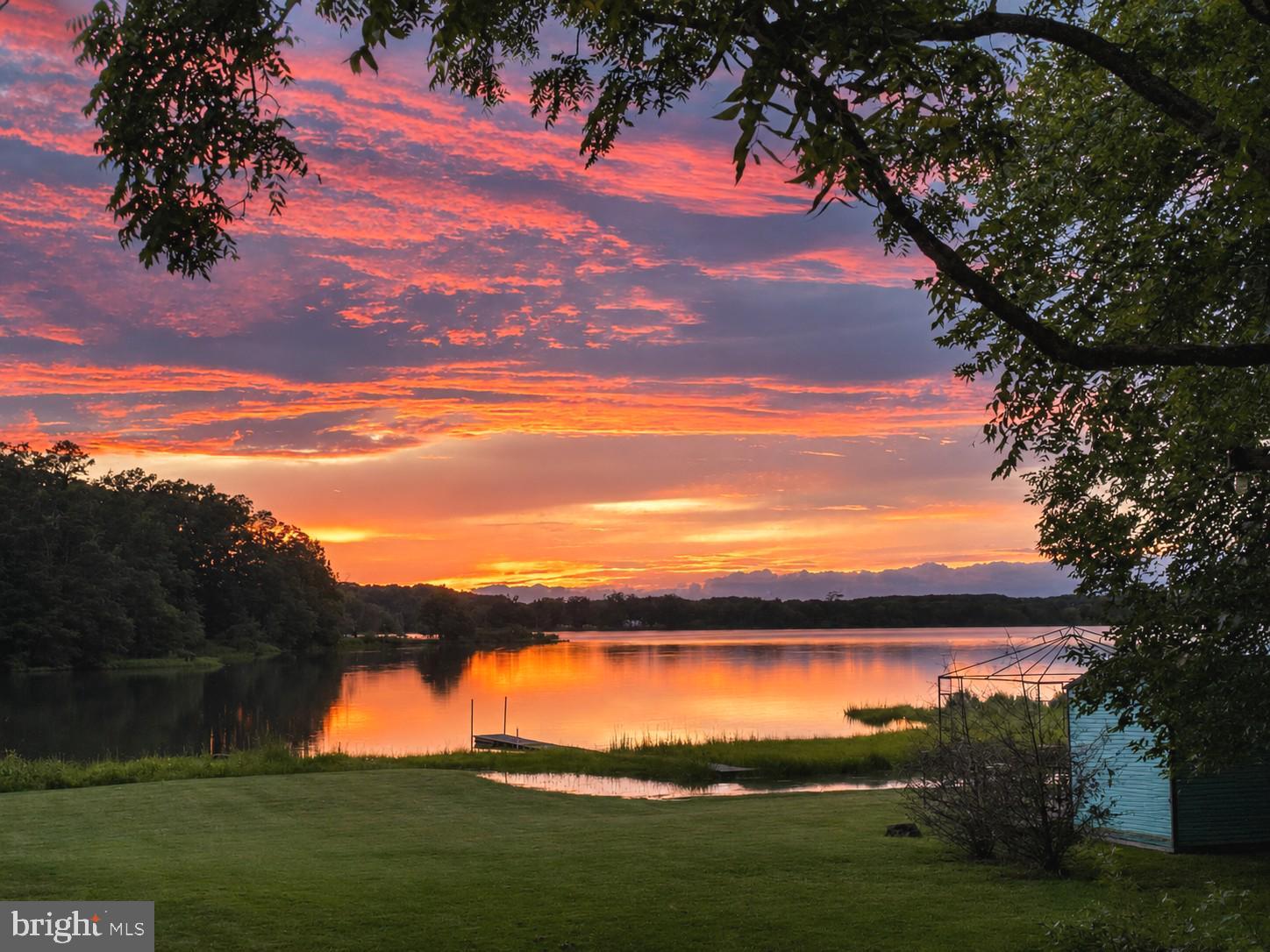 8090 Bozman Neavitt Road St. Michaels, MD 21663 - Photo 12 of 33 a view of a lake with a yard