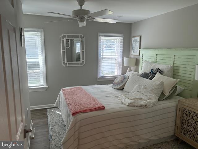8090 Bozman Neavitt Road St. Michaels, MD 21663 - Photo 13 of 33 a bedroom with a bed and window