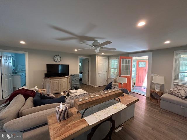 8090 Bozman Neavitt Road St. Michaels, MD 21663 - Photo 23 of 33 a living room with furniture a flat screen tv and a large window