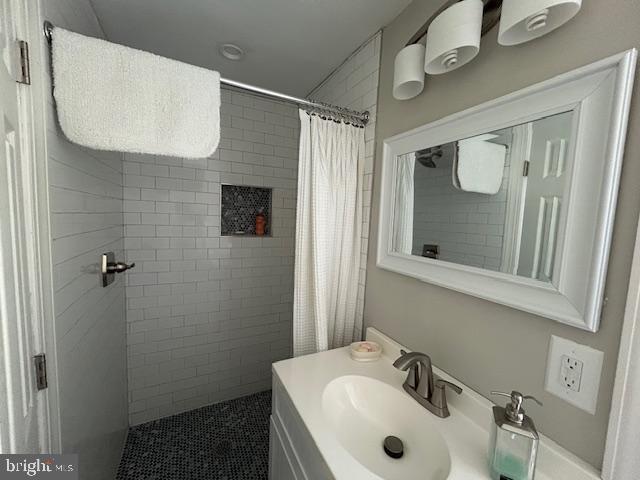 8090 Bozman Neavitt Road St. Michaels, MD 21663 - Photo 24 of 33 a bathroom with a sink and mirror