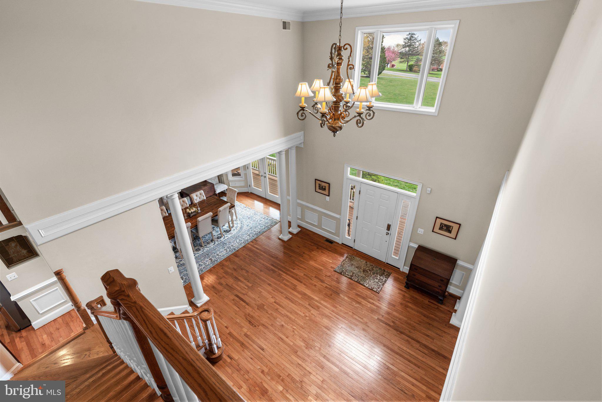 10855 Bethesda Church Road Damascus, MD 20872 - Photo 39 of 92 a living room with furniture and a wooden floor