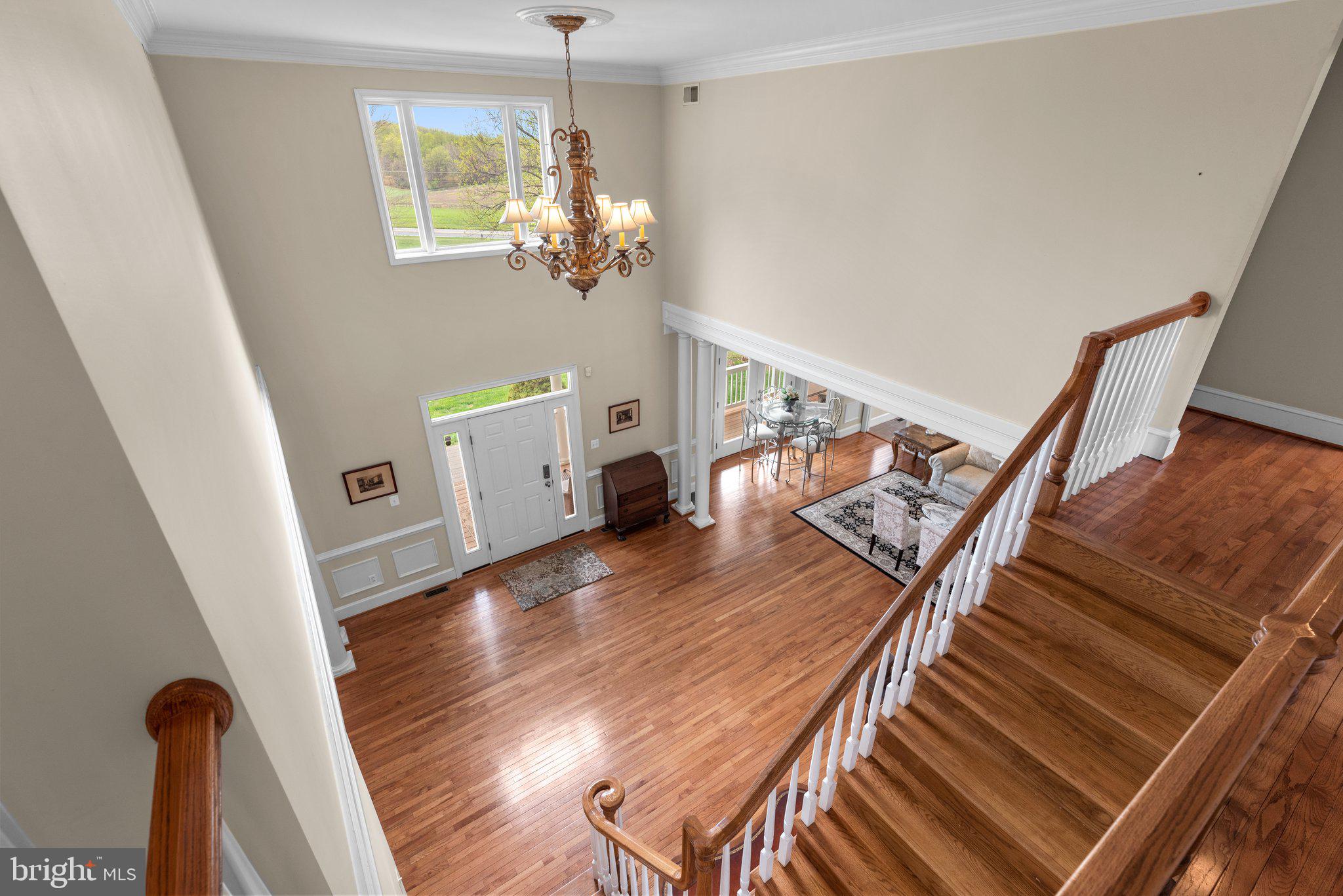 10855 Bethesda Church Road Damascus, MD 20872 - Photo 40 of 92 a view of a livingroom with wooden floor and stairs