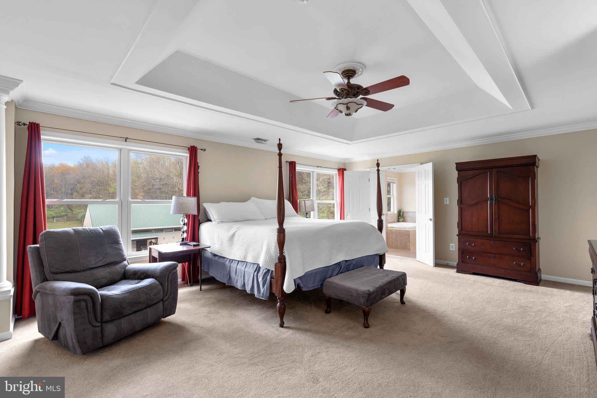 10855 Bethesda Church Road Damascus, MD 20872 - Photo 43 of 92 a spacious bedroom with a bed couch and window