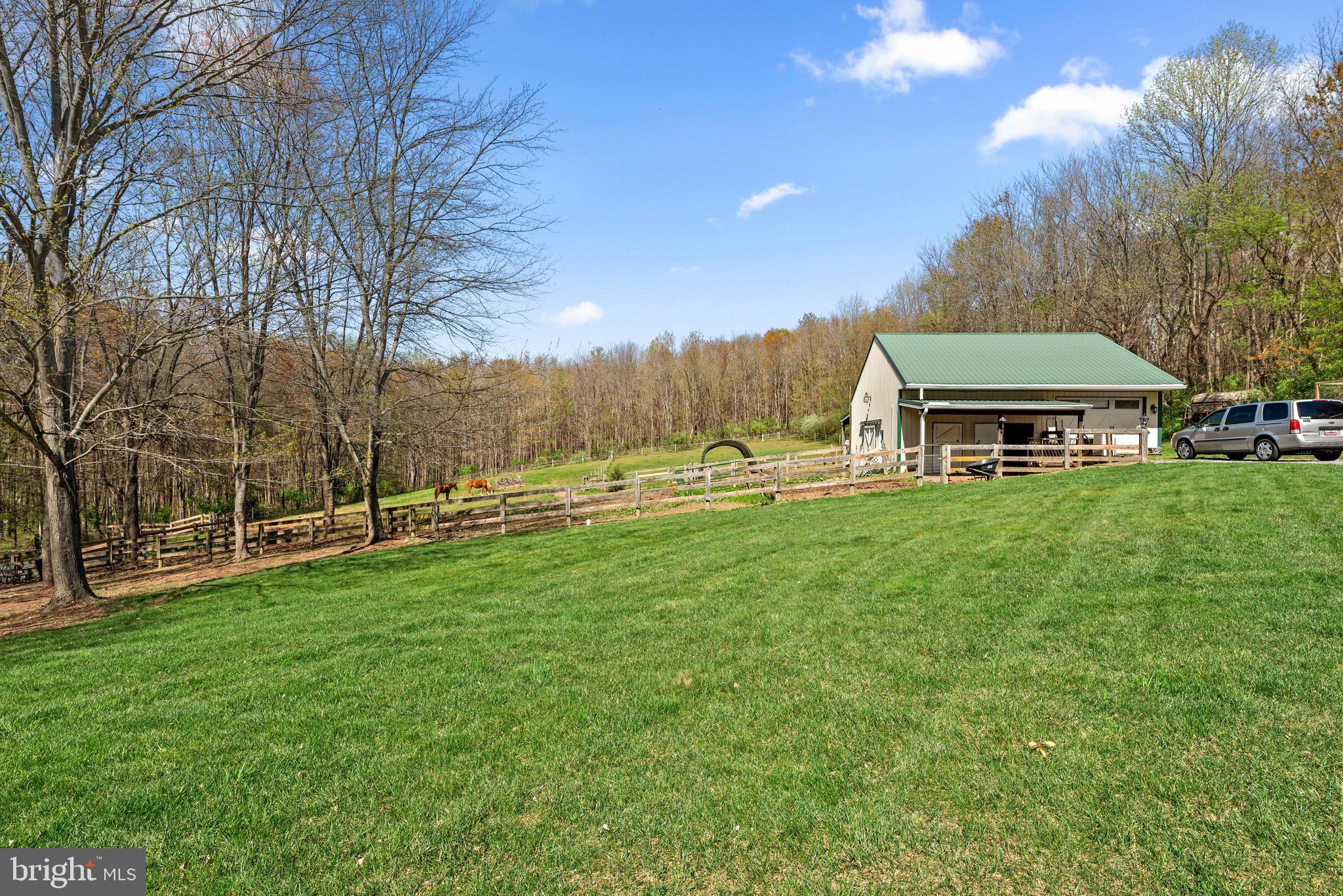 10855 Bethesda Church Road Damascus, MD 20872 - Photo 72 of 92 a view of a house with a big yard and large trees