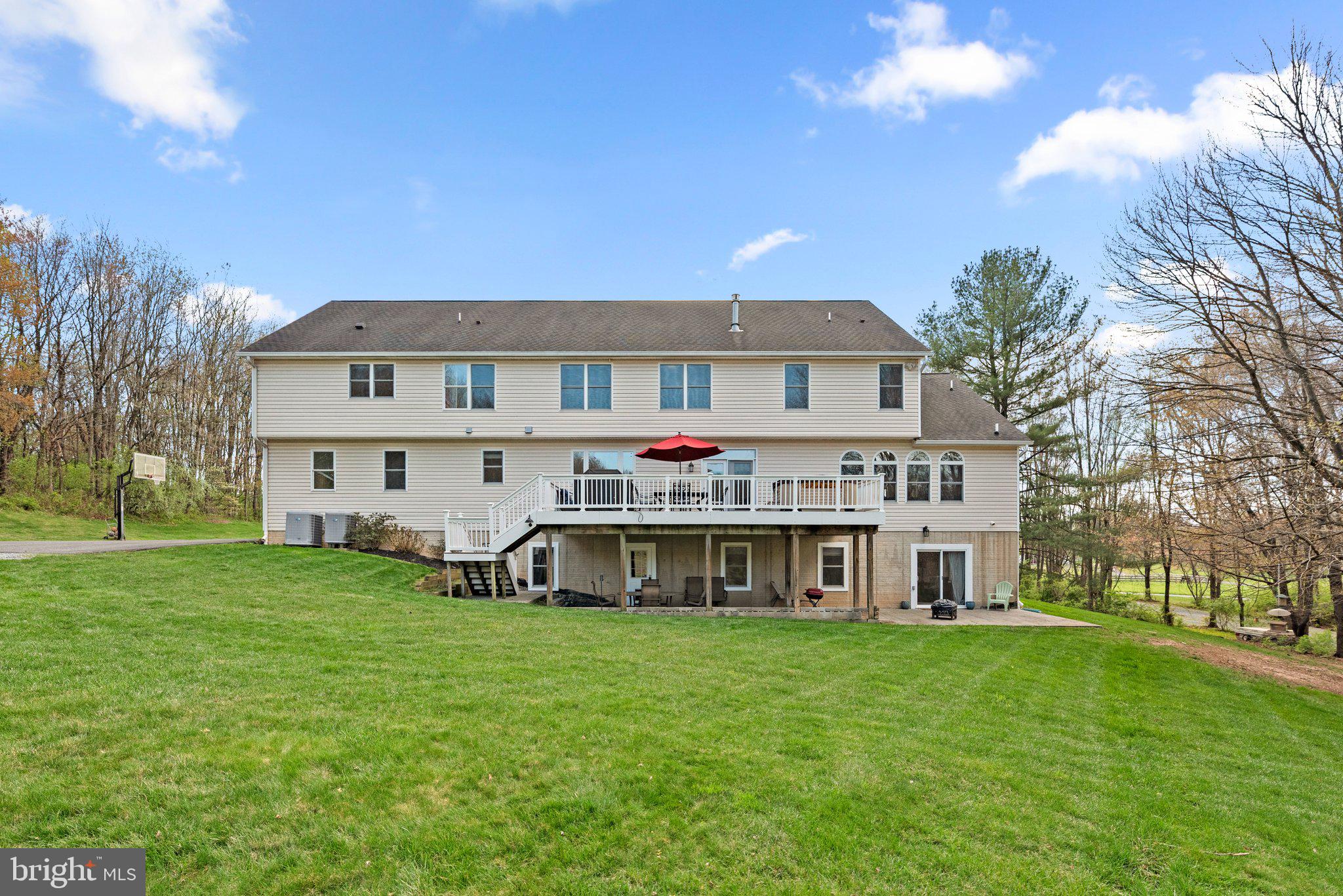 10855 Bethesda Church Road Damascus, MD 20872 - Photo 82 of 92 a view of a house with a big yard and large trees