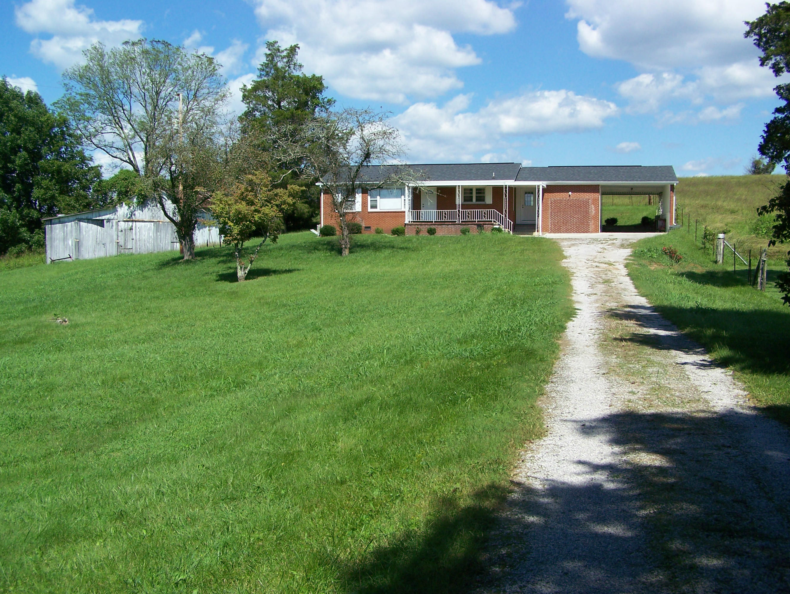 Front photo with barn