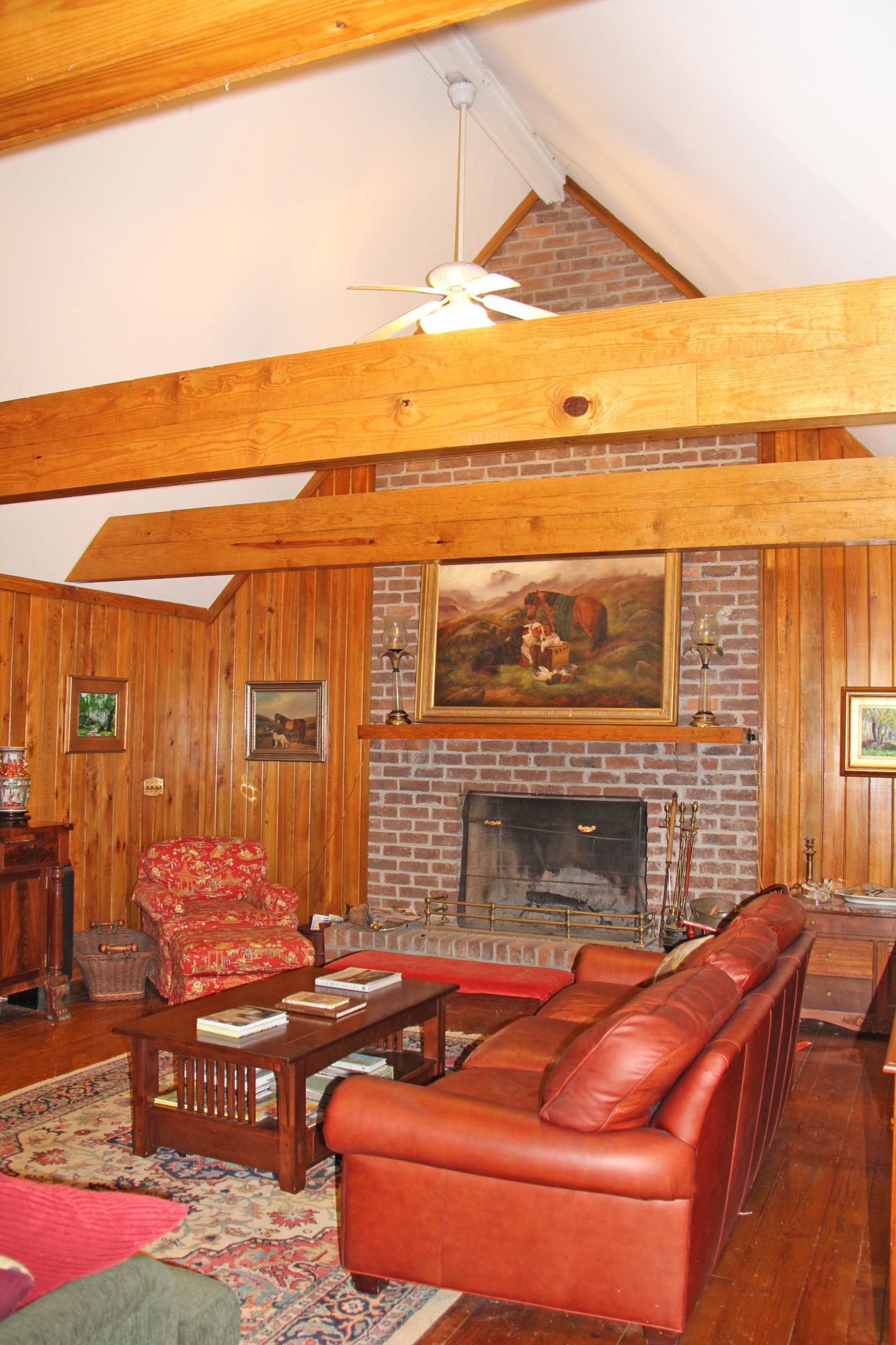 6775 Bears Bluff Road Wadmalaw Island, SC 29487 - Photo 12 of 26 Den with brick fireplace