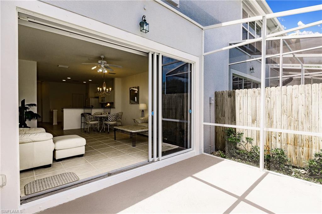 15451 Marcello Circle, Unit 229 Naples, FL 34110 - Photo 14 of 30 a living room with furniture