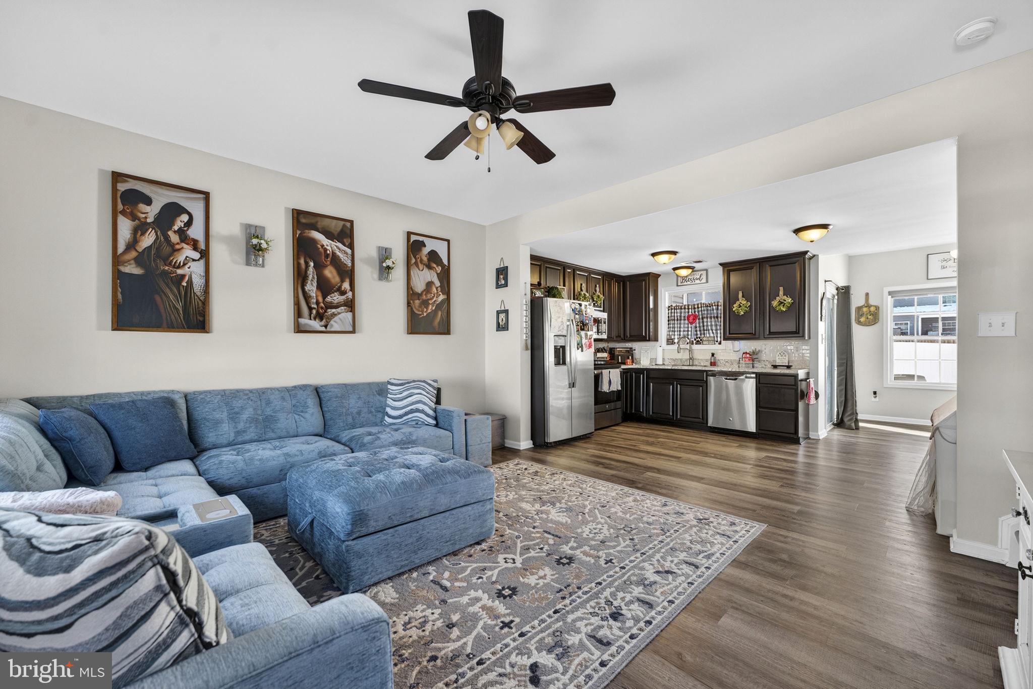 37 Knowledge Court Inwood, WV 25428 - Photo 12 of 53 a living room with furniture and kitchen view