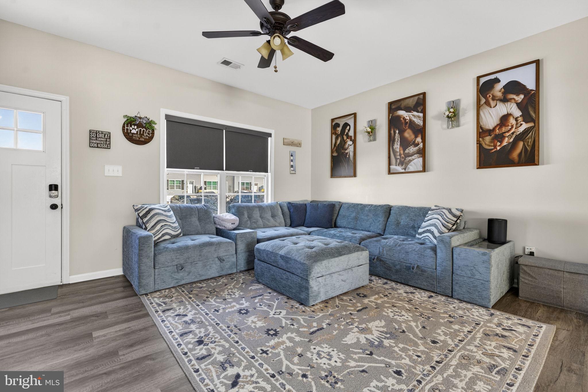 37 Knowledge Court Inwood, WV 25428 - Photo 13 of 53 a living room with couches and a flat screen tv