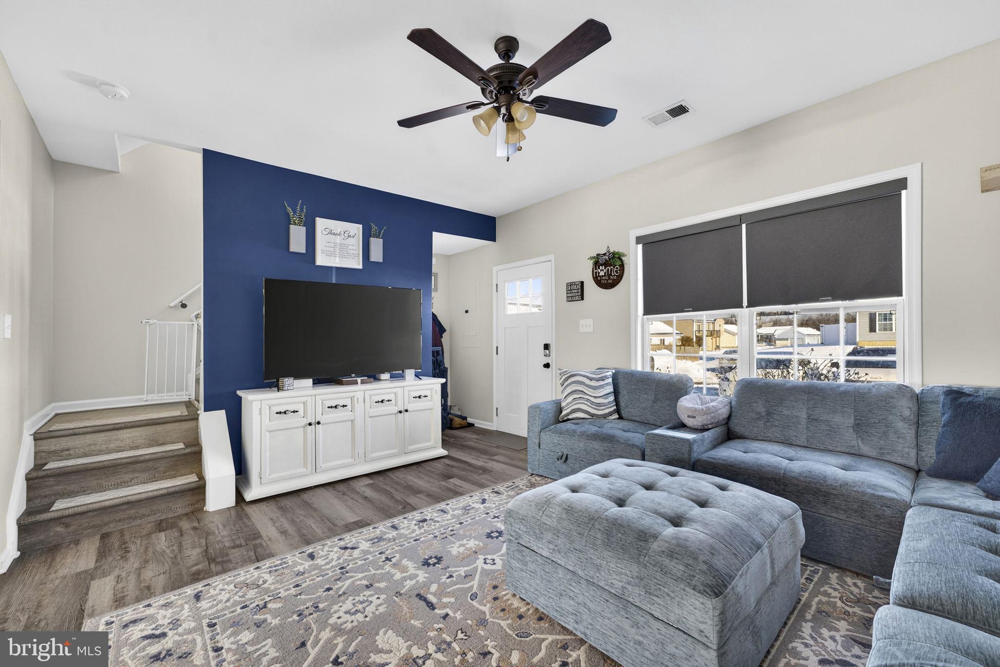 37 Knowledge Court Inwood, WV 25428 - Photo 14 of 53 a living room with furniture and a flat screen tv