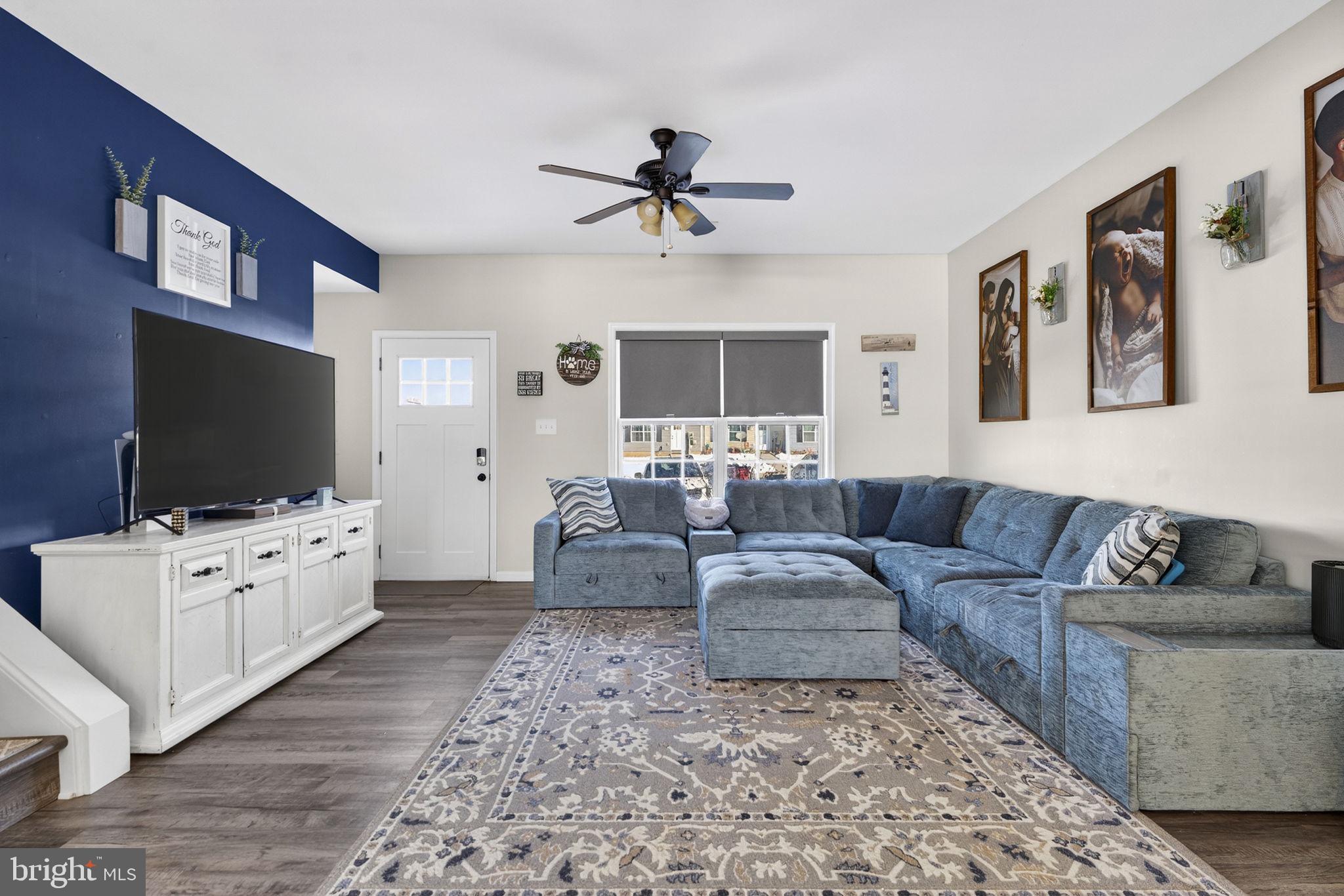 37 Knowledge Court Inwood, WV 25428 - Photo 15 of 53 a living room with furniture and a flat screen tv