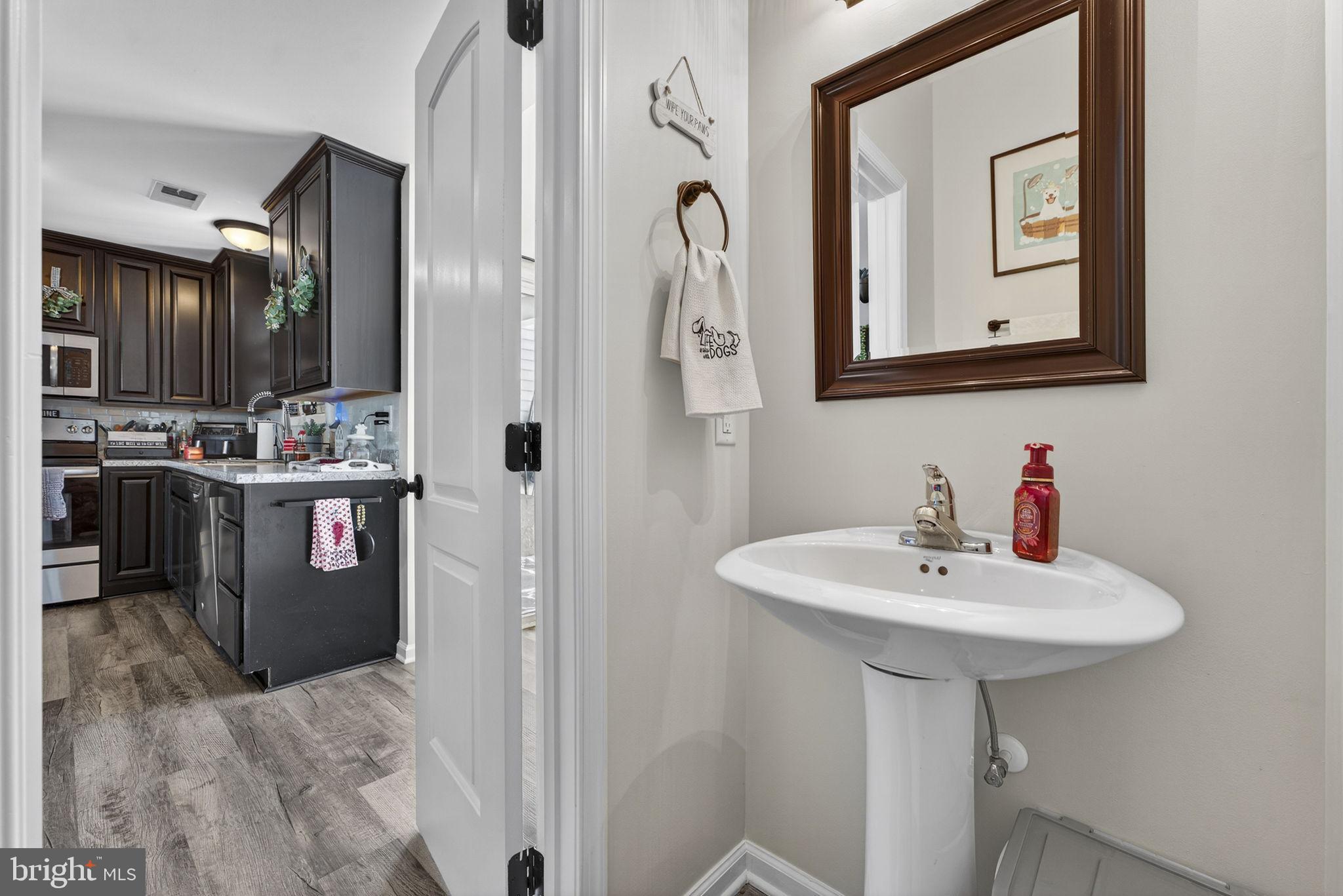 37 Knowledge Court Inwood, WV 25428 - Photo 19 of 53 a bathroom with a sink a mirror and a shower