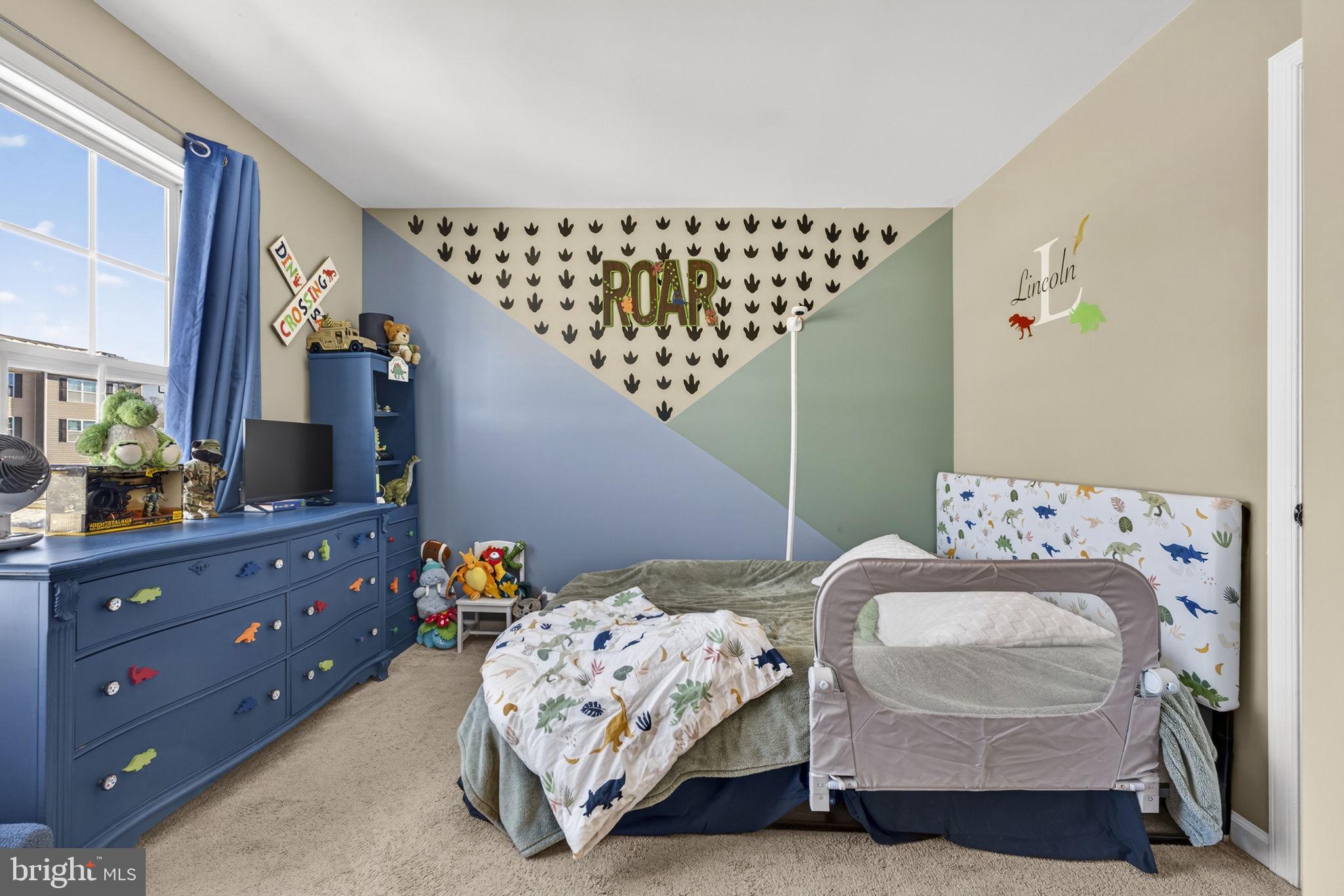 37 Knowledge Court Inwood, WV 25428 - Photo 22 of 53 a bedroom with a bed and wooden floor