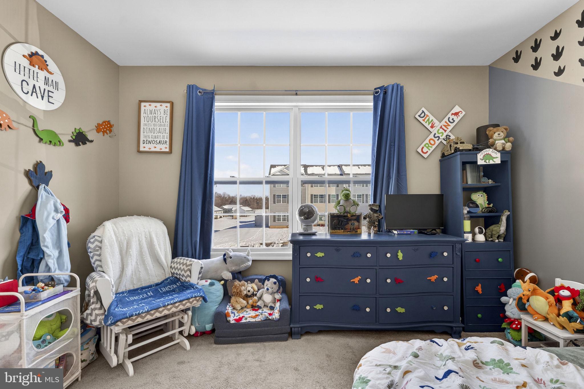 37 Knowledge Court Inwood, WV 25428 - Photo 23 of 53 a bedroom with a bed and a window
