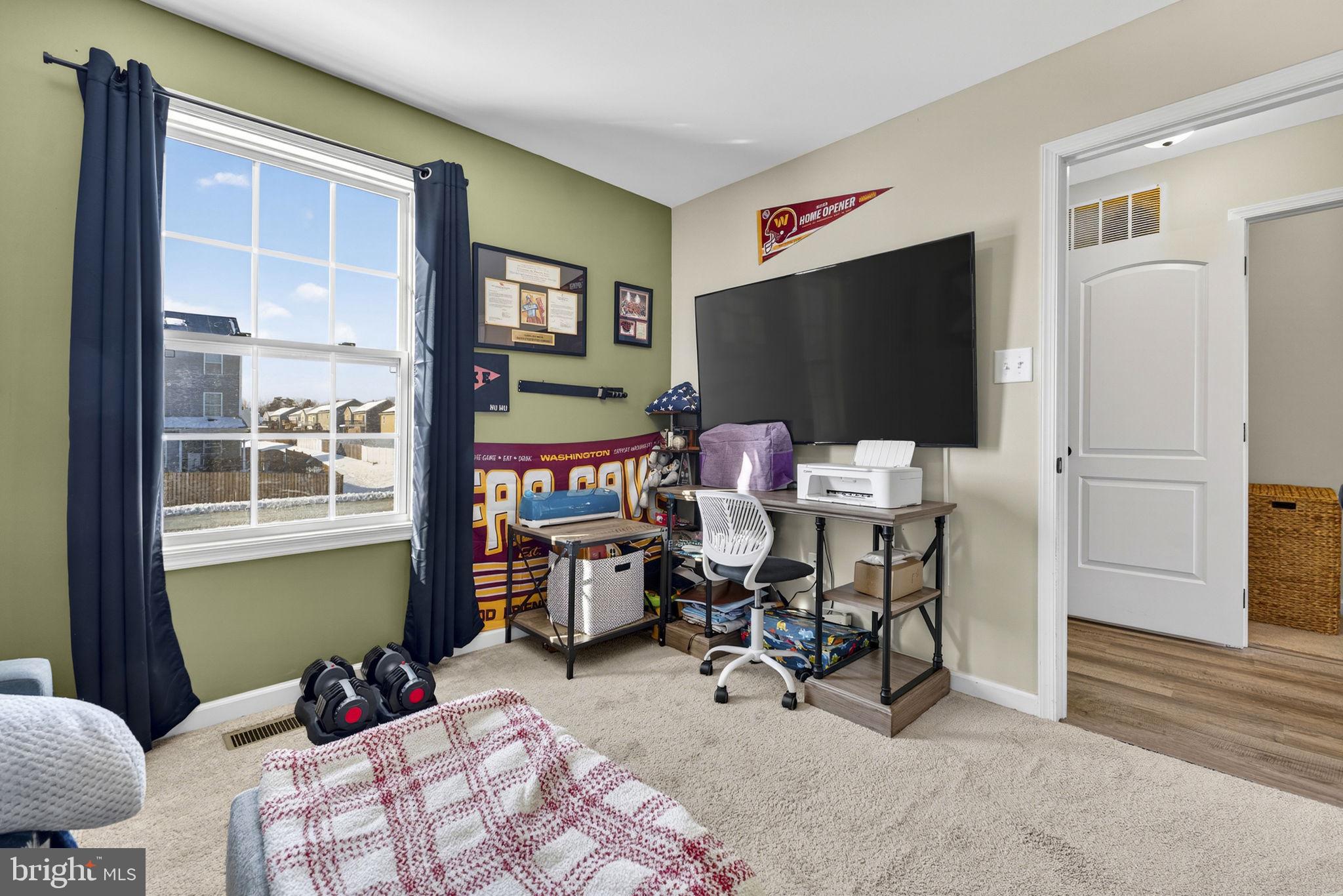 37 Knowledge Court Inwood, WV 25428 - Photo 26 of 53 a bedroom with a bed and a flat screen tv