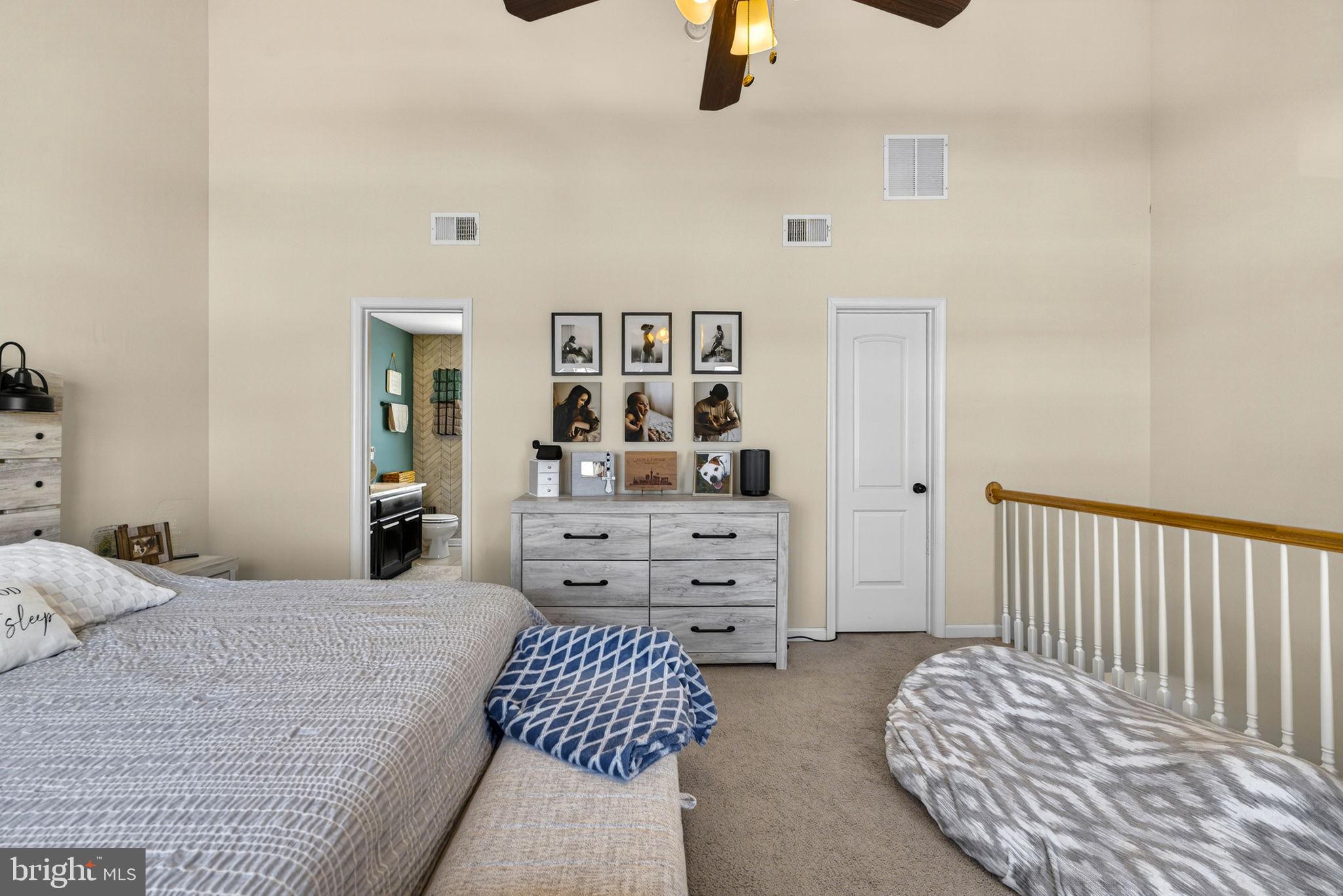 37 Knowledge Court Inwood, WV 25428 - Photo 34 of 53 a bedroom with furniture and a lamp