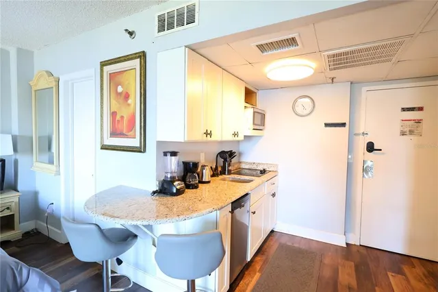 a view of living room with furniture and flat screen tv