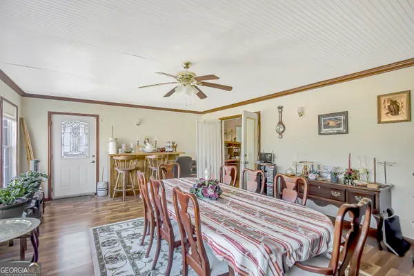 a view of a dining room with furniture