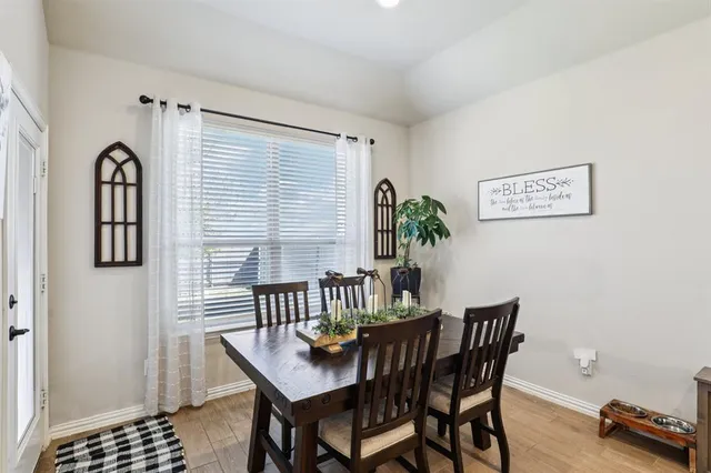 a view of a dining room with furniture