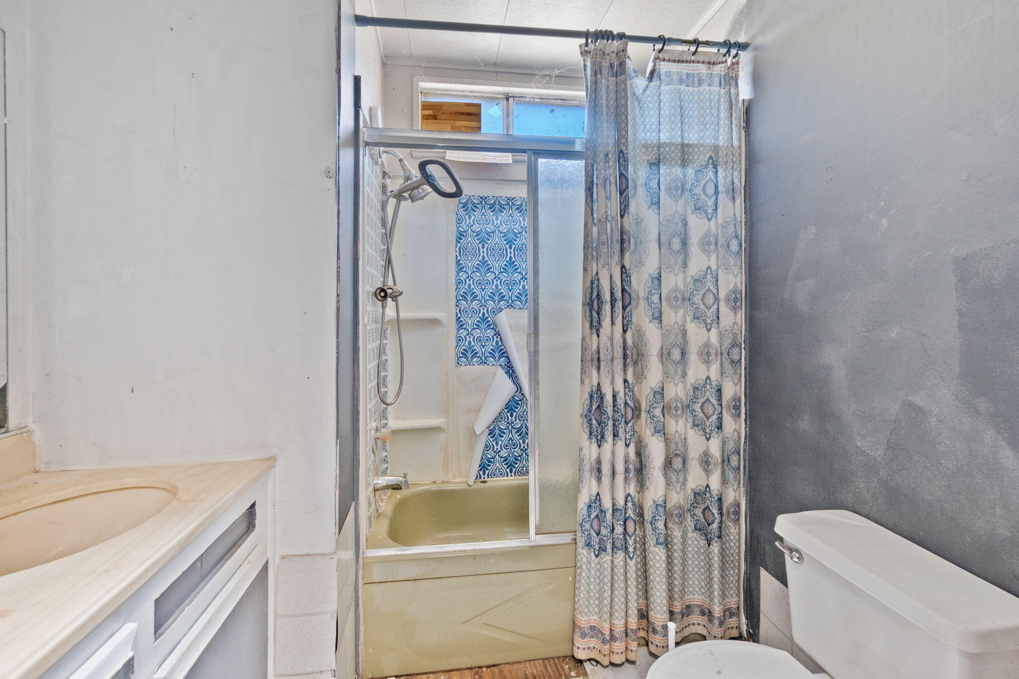 13957 Gas Point Road Igo, CA 96047 - Photo 12 of 18 a bathroom with a granite countertop sink toilet and shower