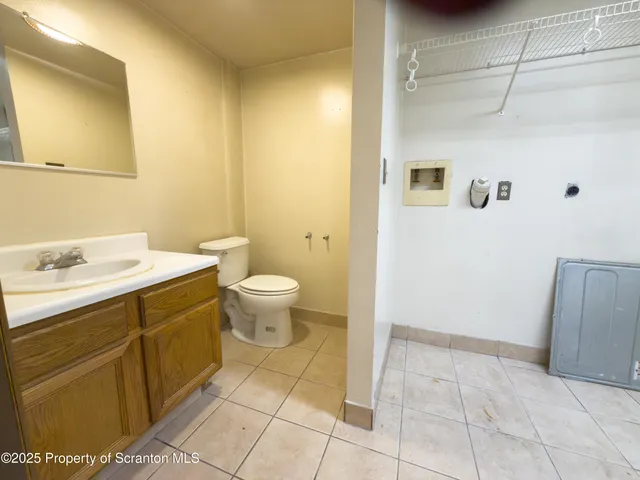 a bathroom with a sink and a toilet