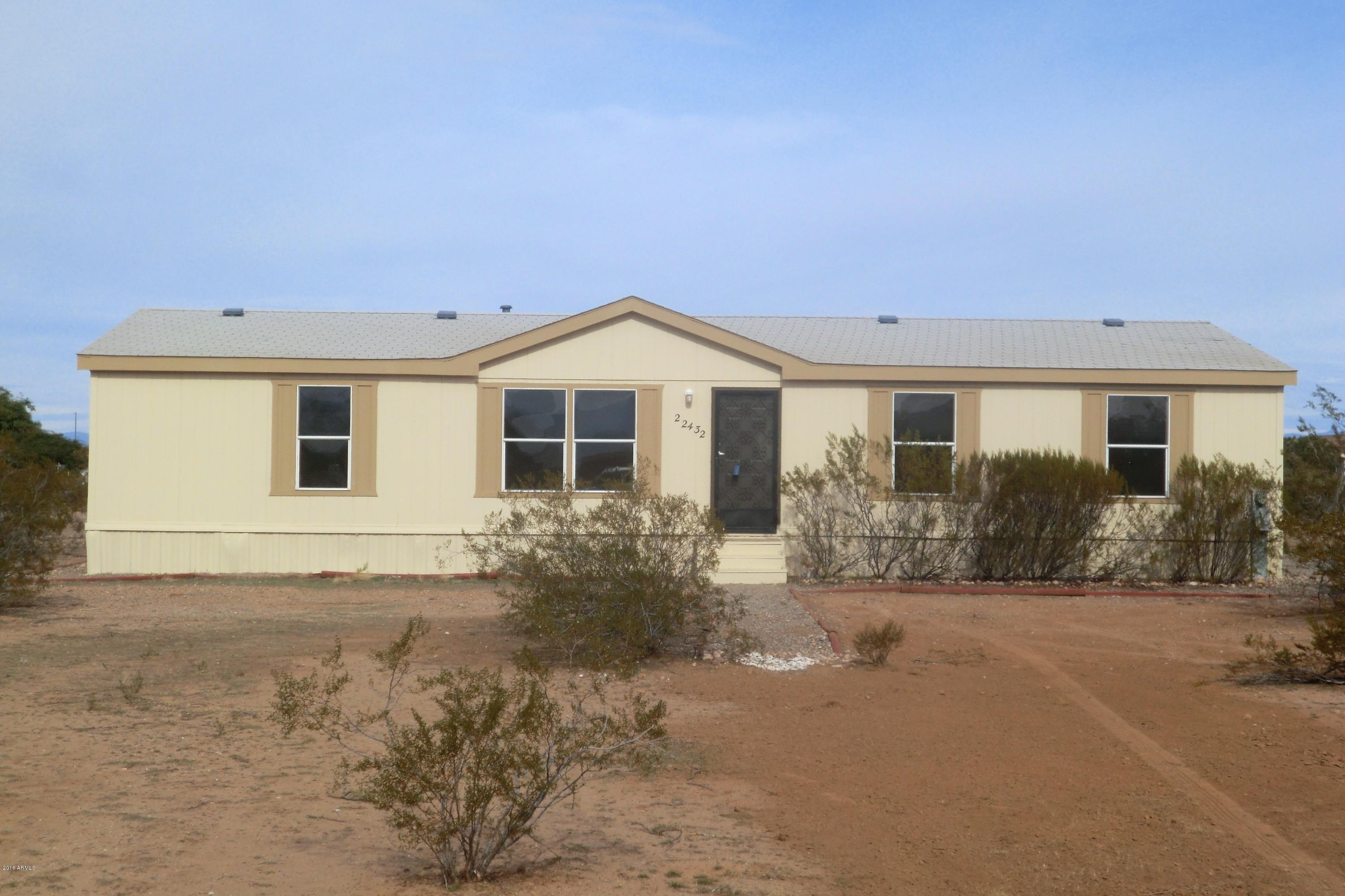 22432 West Peak View Road Wittmann, AZ 85361 - Photo 1 of 14 4 BED 2 BATH ON OVER AN ACRE