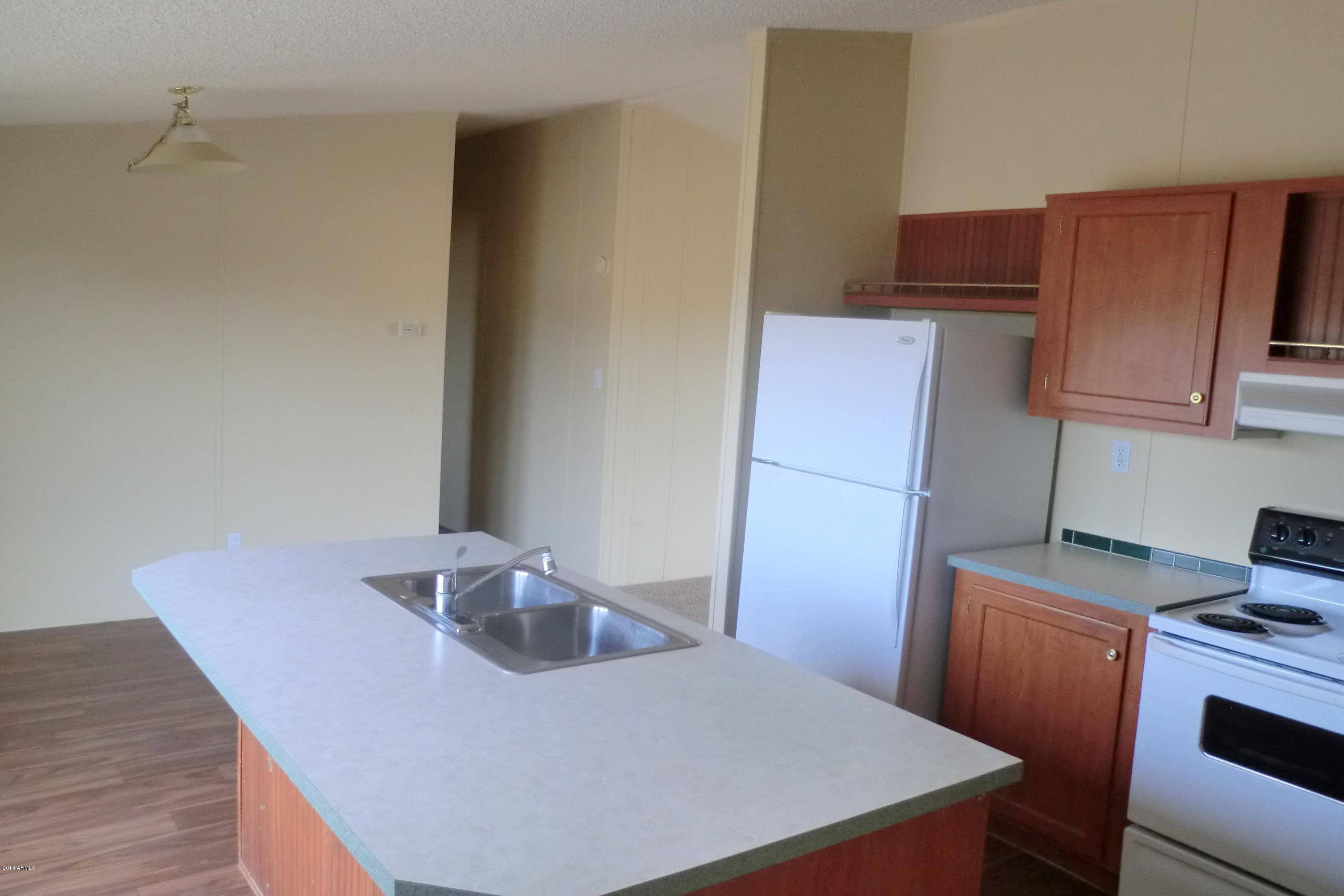 22432 West Peak View Road Wittmann, AZ 85361 - Photo 6 of 14 EAT IN KITCHEN