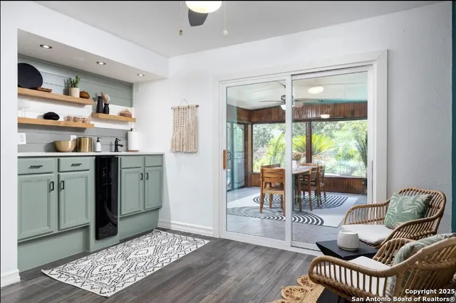 a living room with furniture and a window