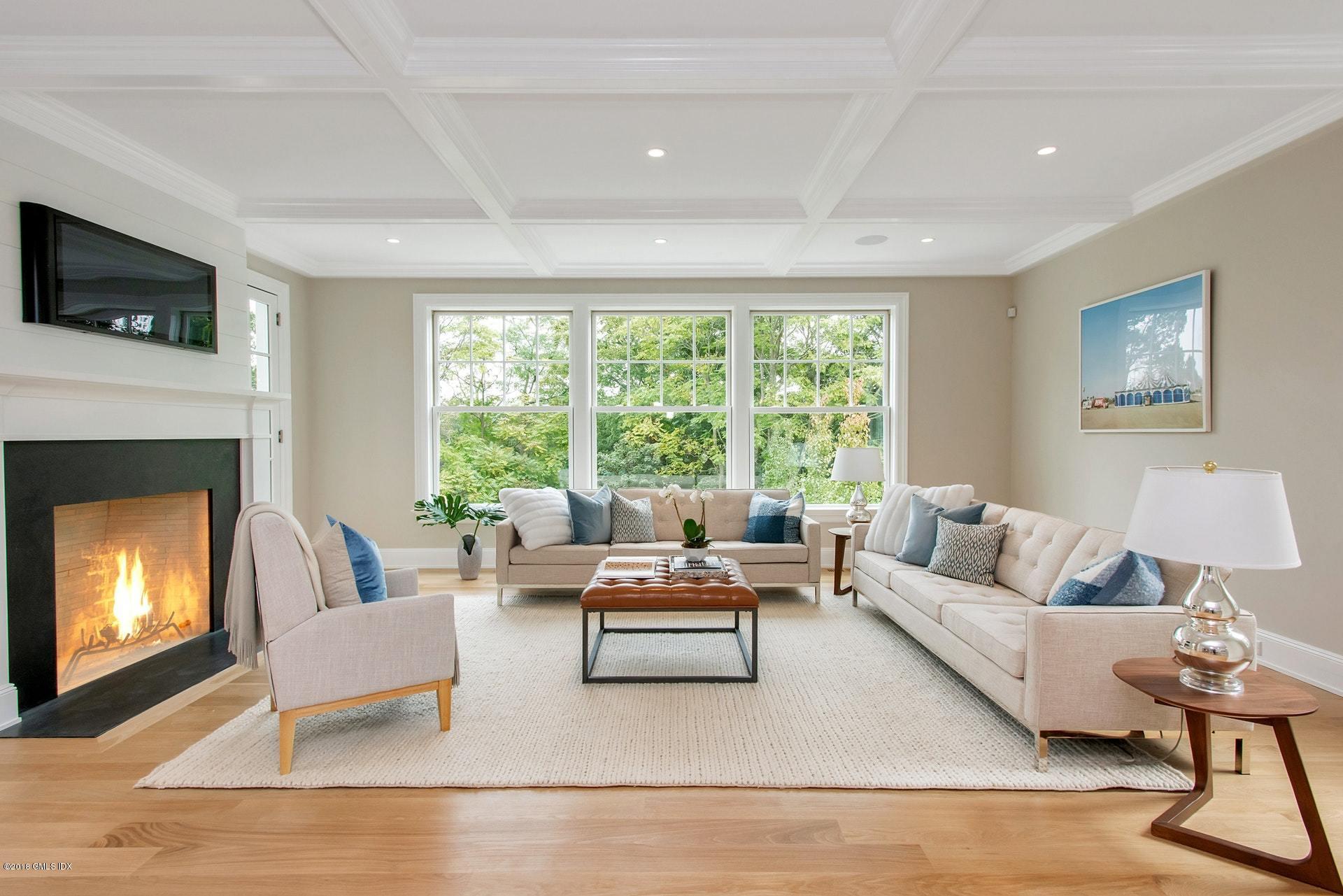 51 Sheep Hill Road Riverside, CT 06878 - Photo 13 of 36 a living room with furniture and a fireplace