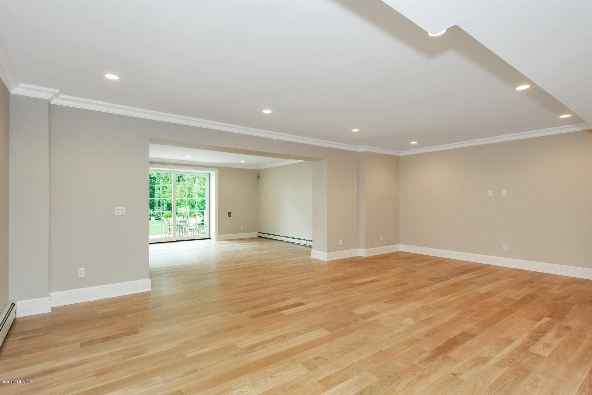 51 Sheep Hill Road Riverside, CT 06878 - Photo 27 of 36 a view of an empty room with wooden floor and a window
