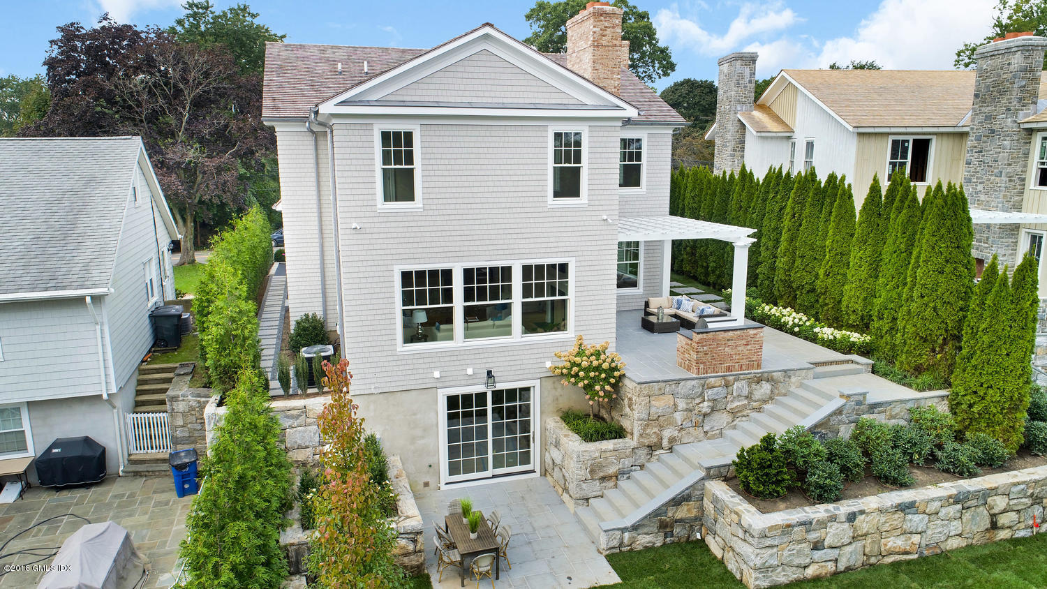 51 Sheep Hill Road Riverside, CT 06878 - Photo 34 of 36 a front view of a house with garden