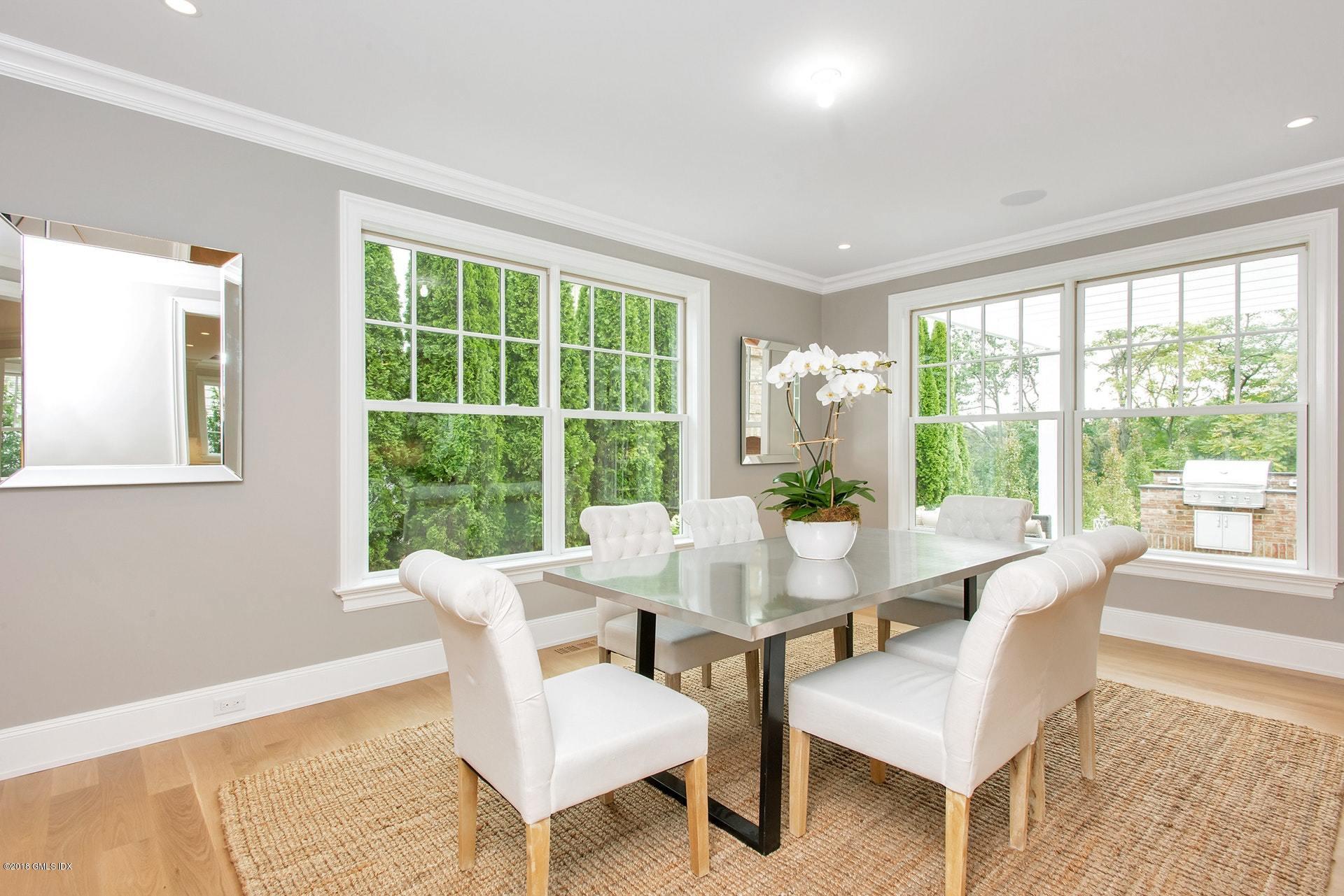 51 Sheep Hill Road Riverside, CT 06878 - Photo 9 of 36 a view of a dining room with furniture window and outside view