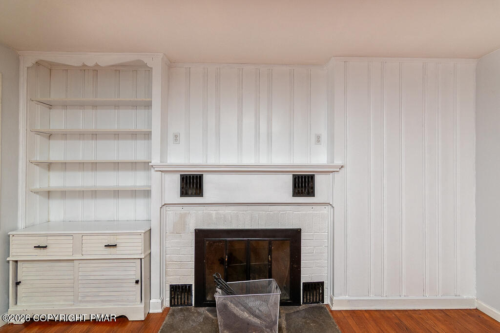 755 White Oak Road Cresco, PA 18326 - Photo 14 of 50 a living room with furniture and a fireplace