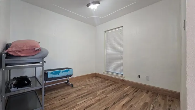 a spacious bathroom with a bathtub and window
