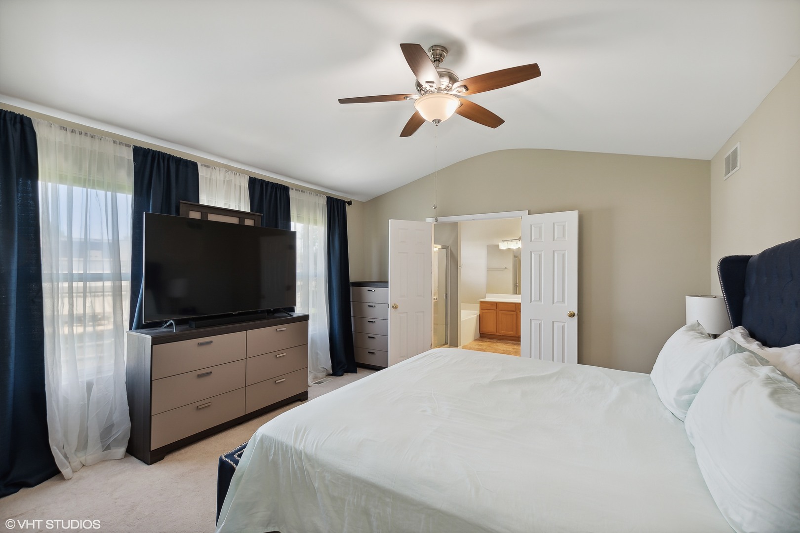 1769 Delta Drive Aurora, IL 60503 - Photo 8 of 14 a bedroom with a large bed and flat tv