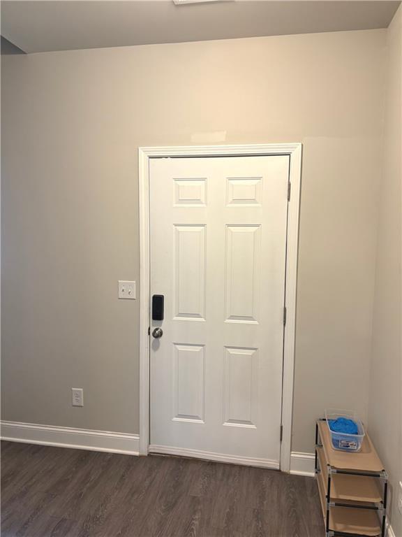 392 Katie Lane Commerce, GA 30529 - Photo 19 of 58 an empty room with a bench