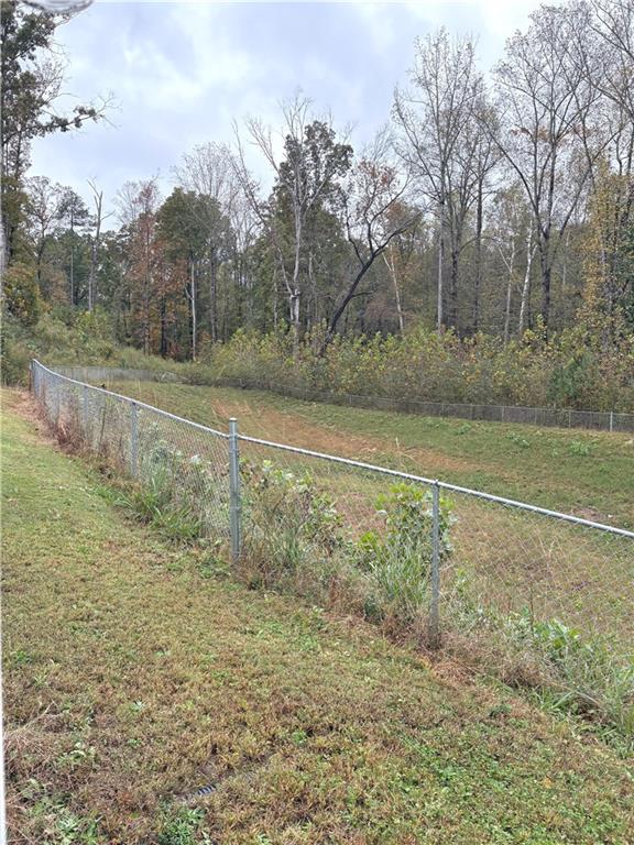392 Katie Lane Commerce, GA 30529 - Photo 31 of 58 a view of a field with trees