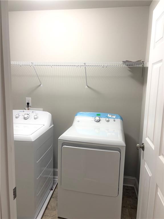 392 Katie Lane Commerce, GA 30529 - Photo 37 of 58 a utility room with dryer and washer