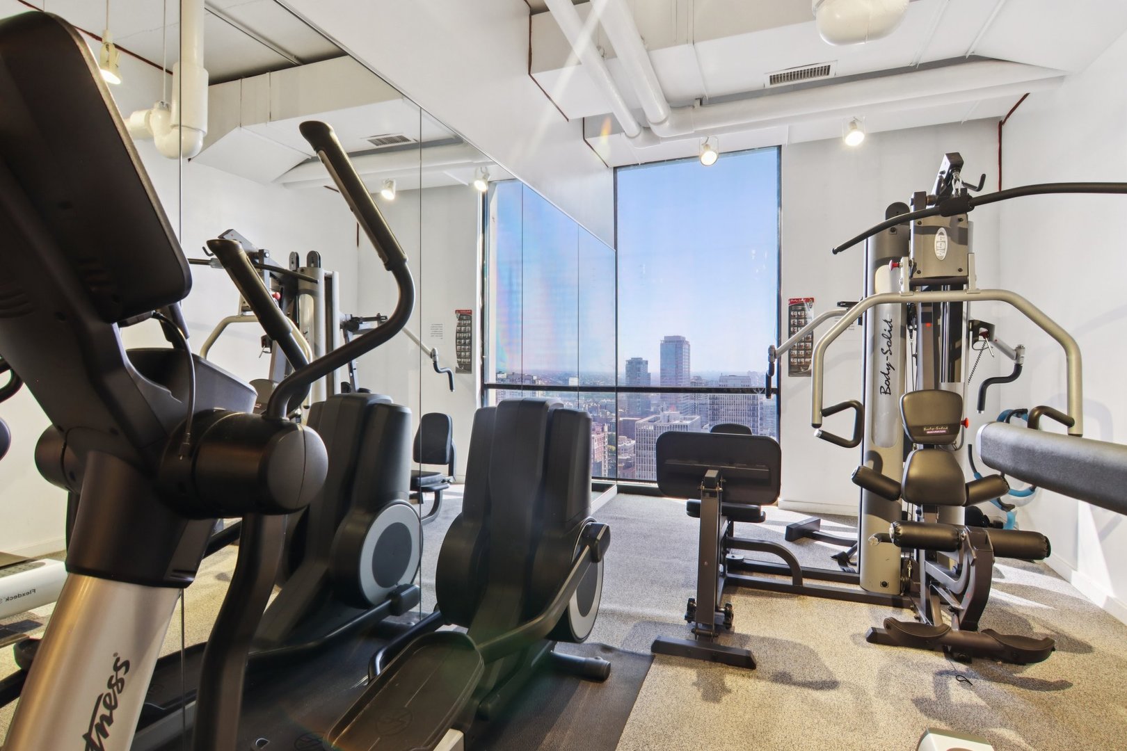 1240 North Lake Shore Drive, Unit 14A Chicago, IL 60610 - Photo 26 of 43 a view of a room with gym equipment