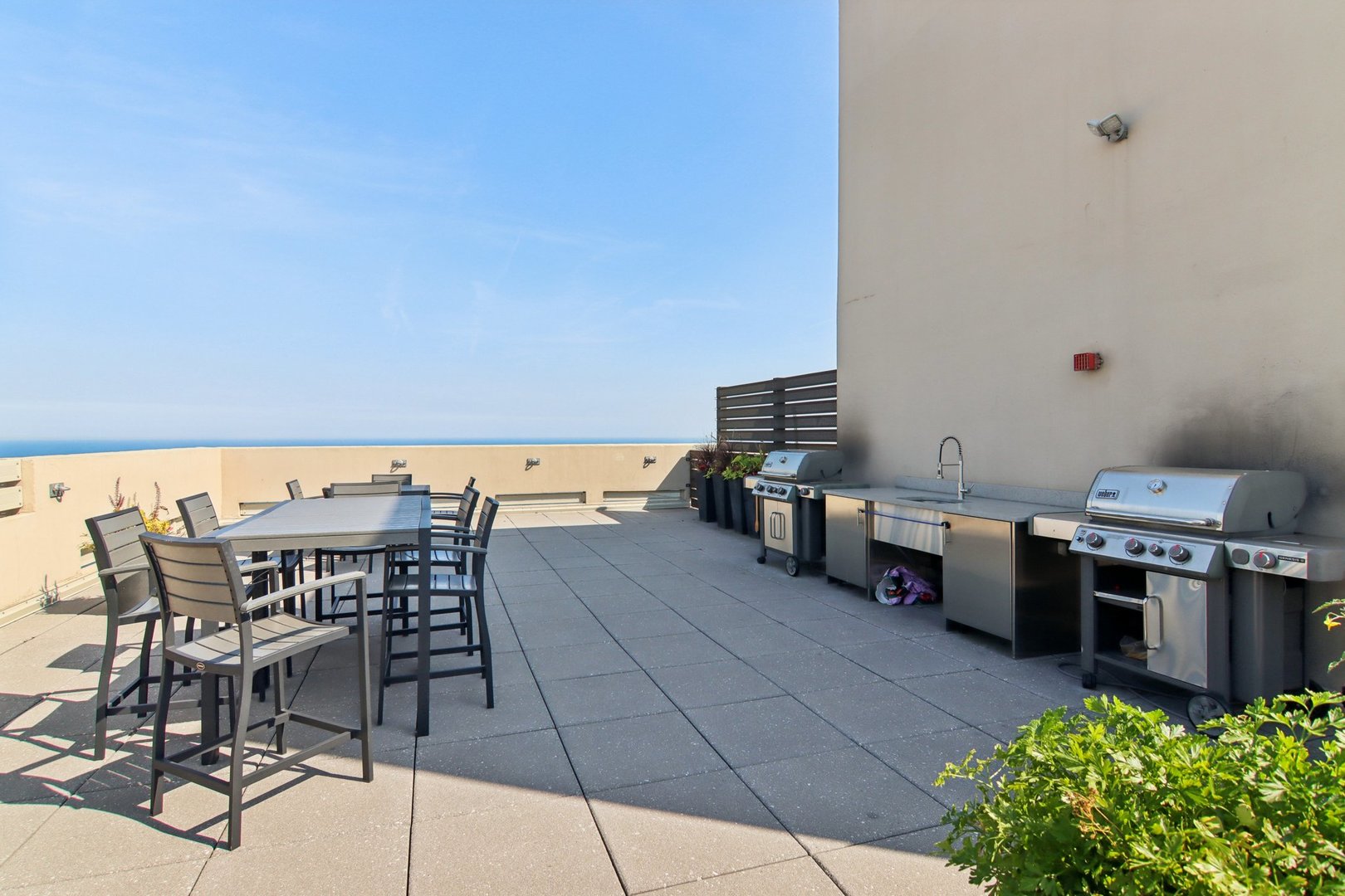 1240 North Lake Shore Drive, Unit 14A Chicago, IL 60610 - Photo 35 of 43 a view of a terrace with furniture and stove