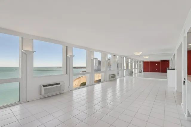 a view of an empty room and window