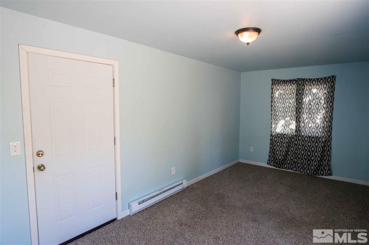 17295 Cold Springs Drive Reno, NV 89508 - Photo 23 of 30 an empty room with windows