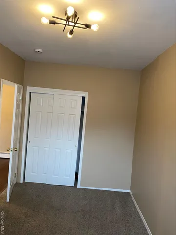 an empty room with a door
