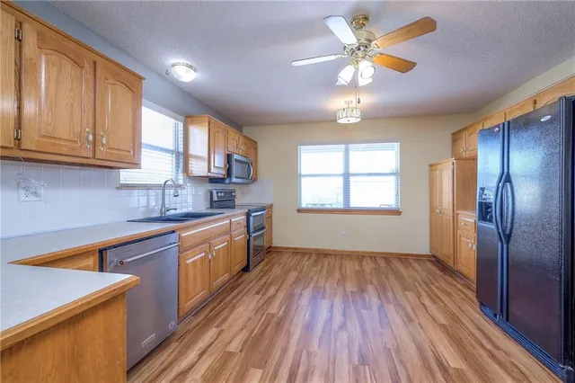 $290,000 | 528 Saturn Drive, Raymore, MO 64083