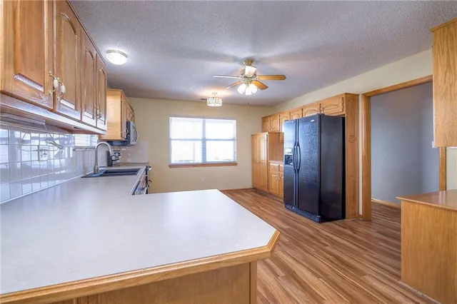 $290,000 | 528 Saturn Drive, Raymore, MO 64083