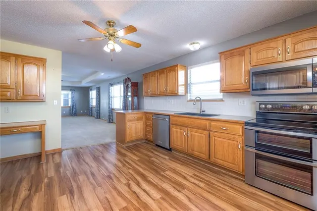 $290,000 | 528 Saturn Drive, Raymore, MO 64083