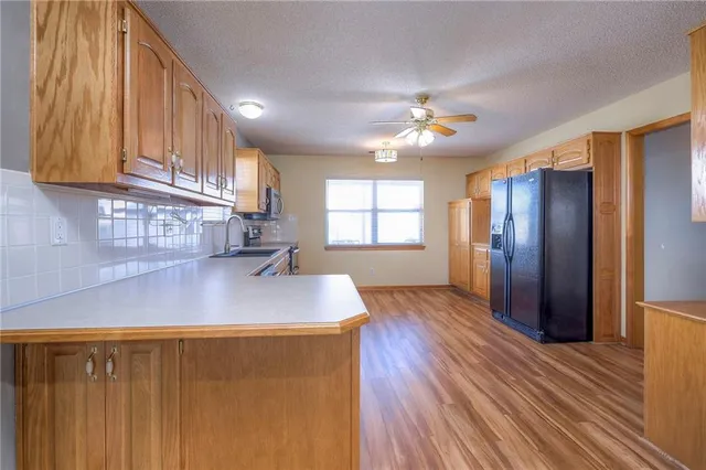 $290,000 | 528 Saturn Drive, Raymore, MO 64083