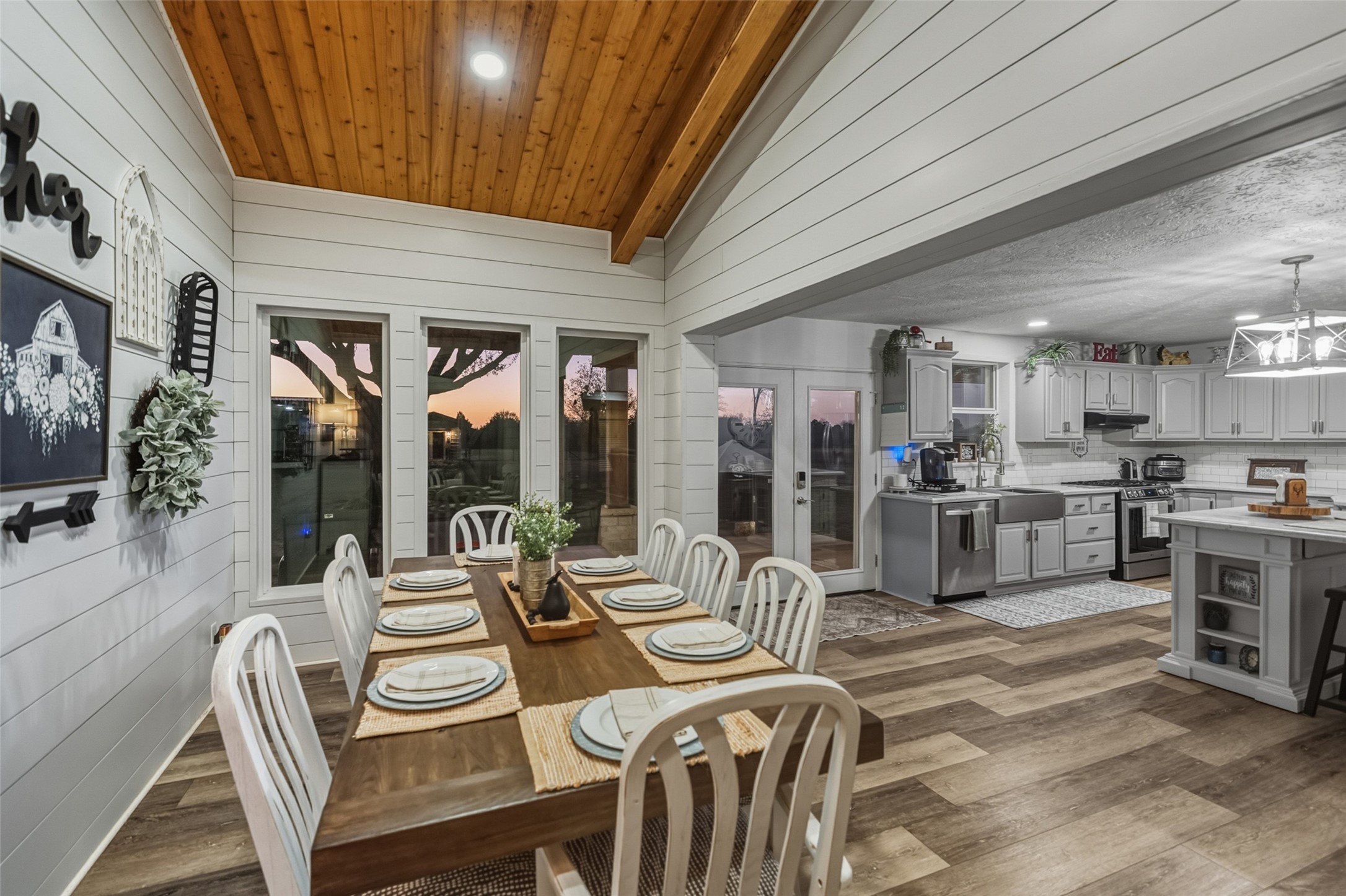 19989 Meadow Bend Road Hempstead, TX 77445 - Photo 7 of 35 Dining room addition (2019) features shiplap walls, wood ceiling, and large windows that bring in natural light.